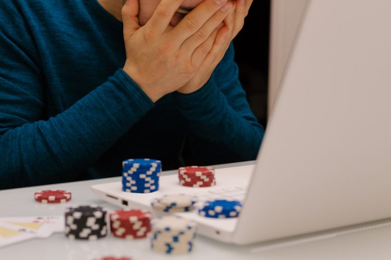 Individual struggling with gambling addiction