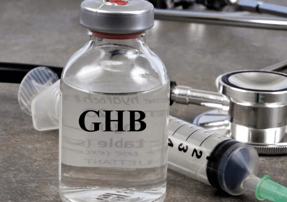 GHB, the 'date rape' drug, commonly used in chemsex, alongside a syringe.