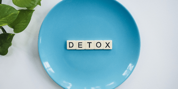 Drug Detox Safely & Comfortably A plate with DETOX written on it