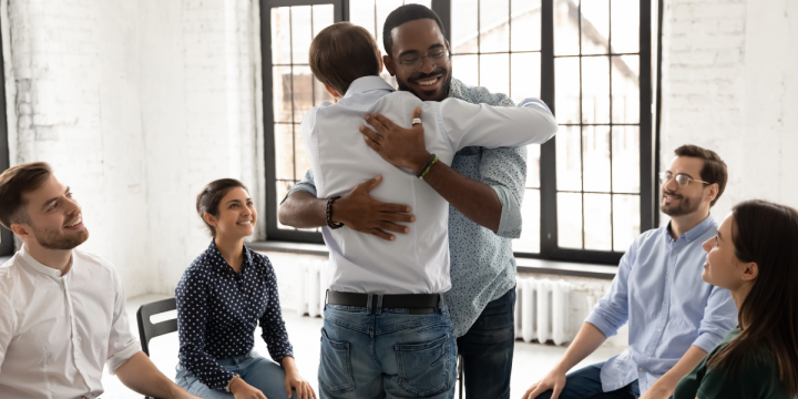 hugging - group therapy - emotional well being