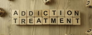 addiction treatment - wooden block letters