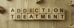 addiction treatment - wooden block letters