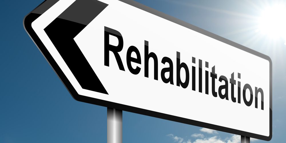 Illustration,Depicting,A,Road,Traffic,Sign,With,A,Rehabilitation,Concept. A road sign with rehabilitation on it