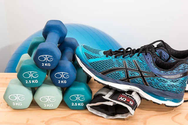 Trainers dumbbells in a pile