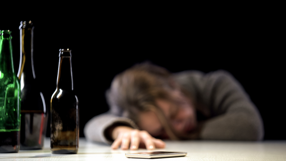 Woman suffering from withdrawal from alcohol