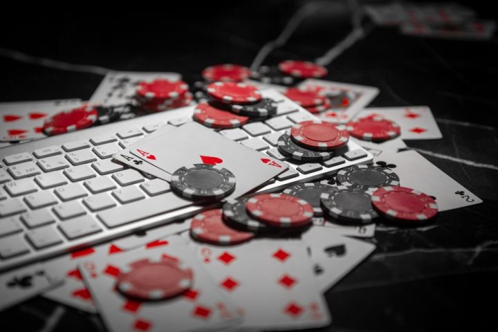 Online,Gambling.,Online,Casino.,Poker,Chips,Lie,On,The,Keyboard. Gambling Addiction