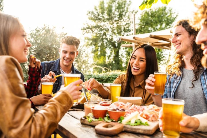 Group,Of,Multi,Ethnic,Friends,Having,Backyard,Dinner,Party,Together Liquid Lunch