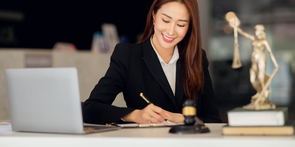 Attractive,Young,Lawyer,In,Office,Business,Woman,And,Lawyers,Discussing LAwyer helping with legal protection for those in recovery from addiction