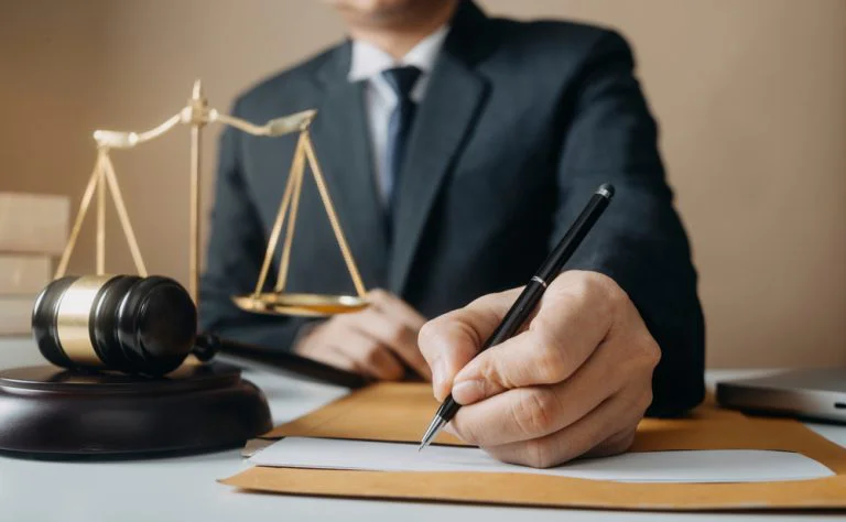 Solicitor writing legal help for addiction