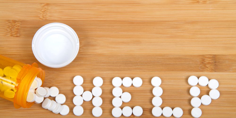 Top,View,Flat,Lay,Bottle,Of,Pain,Pills,Spilled,On Help with addiction to Vicodin