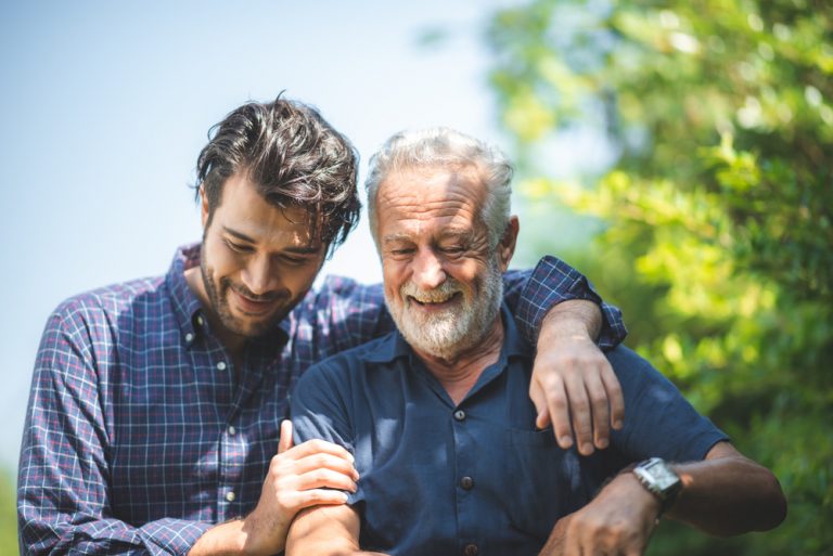 Father and Son embrace after rehab