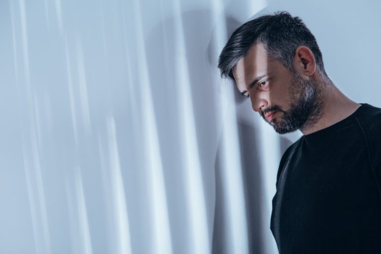 Individual struggling before rehab starts