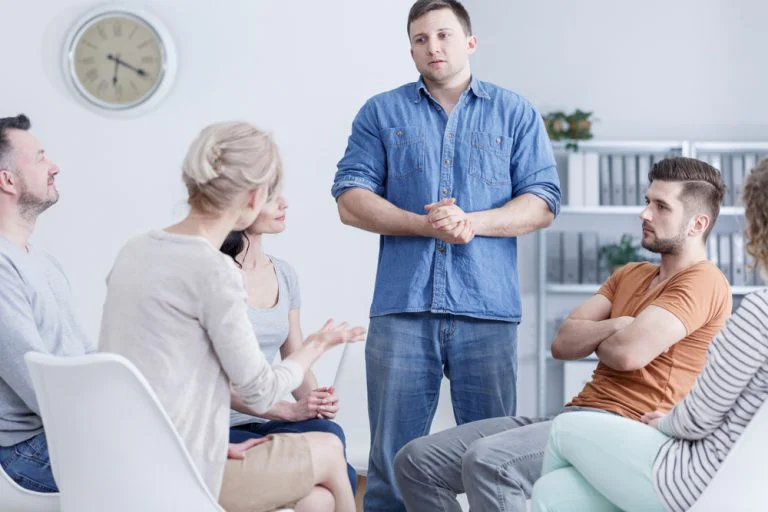 Individual taking part in group therapy