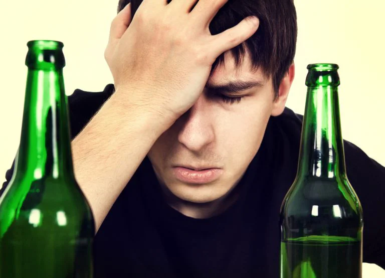 Man looking sad after drinking