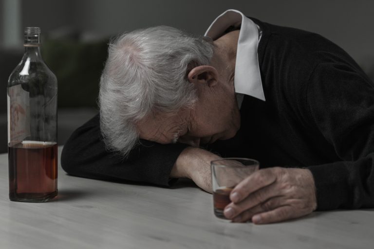 Older man with addiction to alcohol