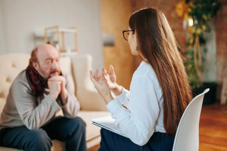 Individual being counselled to help with addiction