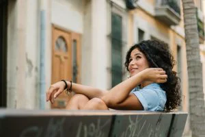 Individual happy after rebuilding their life